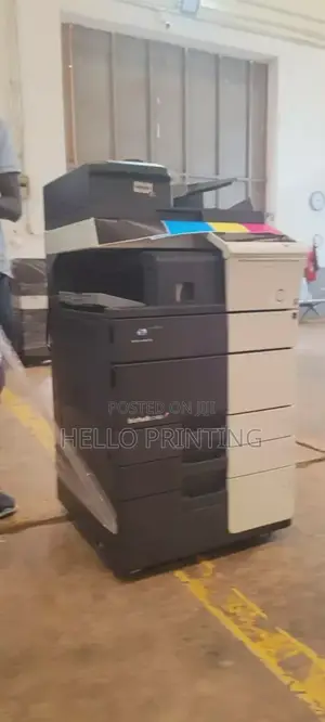 Print Big , Save More - Konica Minolta C458.