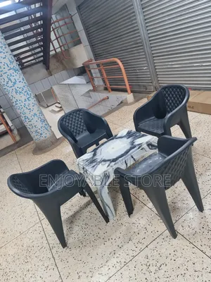 Considered Plastic Chairs and Table for Beach/Balcony/Bars