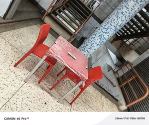 Photo - Outdoor Plastic Restaurant Chairs and Table
