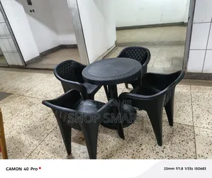 Photo - 4plastic Chairs and Table
