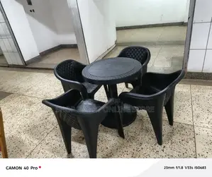 4plastic Chairs and Table