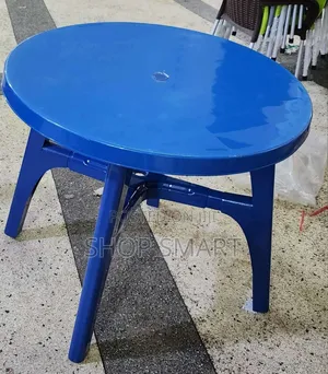 Photo - Round Blue Plastic Table Round Blue Plastic Table
