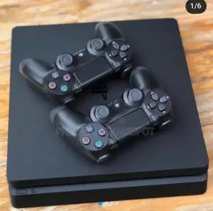 Playstation Four (Ps4) Slim With Games Installed