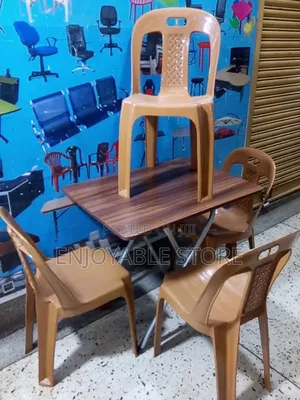Photo - Gold Plastic Chairs and Table Set