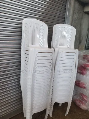 Photo - Plain White Armless Plastic Chairs