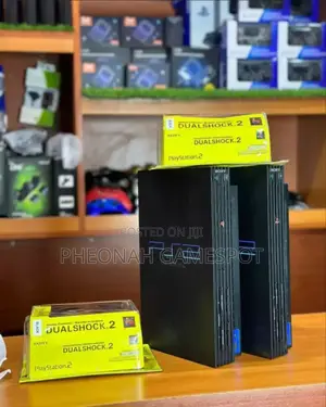Playstation 2 Ps2 With 36 Games and 2 Controllers