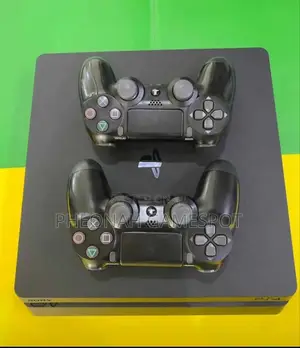 Brand New Playstation 4 Slim Comes With It's Box and Games