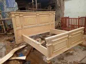 Photo - Wooden Bed
