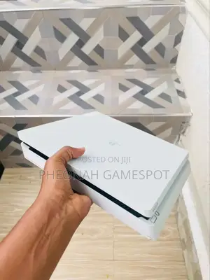 Very Neat and Clean Playstation 4 Slim. Ps4 With 18 Games