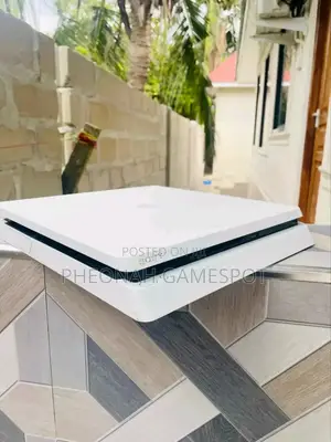 Very Neat and Clean Playstation 4 Slim. Ps4 With 18 Games