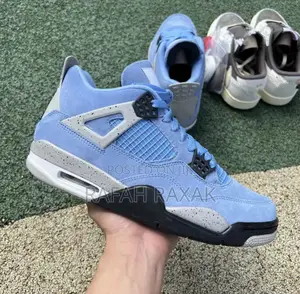 Original Air Jordan 4s Retro University Blue Suede Sneakers