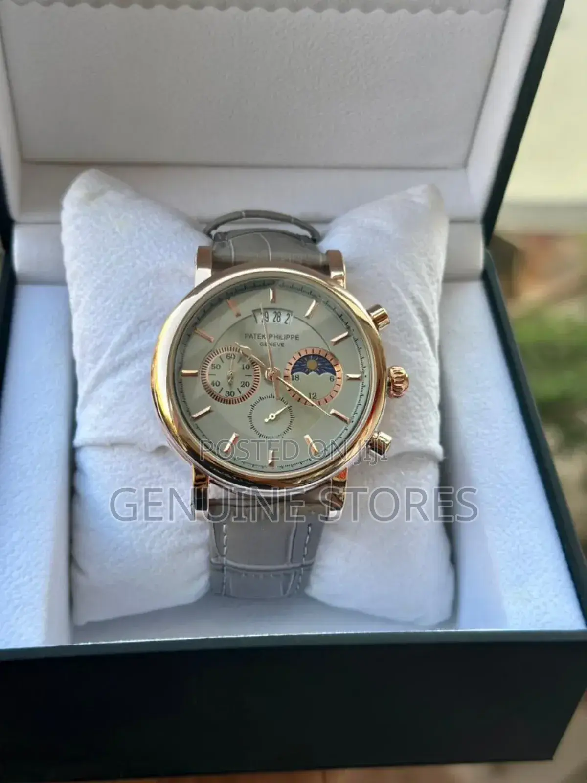 Patek Phillipe Geneve Men's Leather Watch.