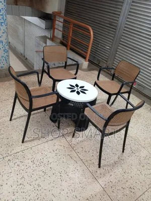 Photo - Black Outdoor Plastic Chairs and Table