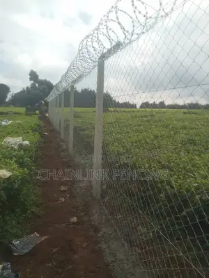 Chain Link Fence Razor Wire Installation.