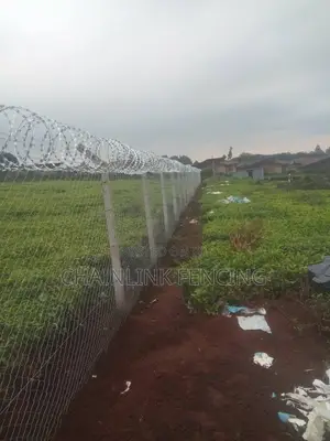 Chain Link Fence Razor Wire Installation.