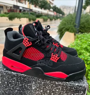 Red Thunders Ironic Jordan 4s