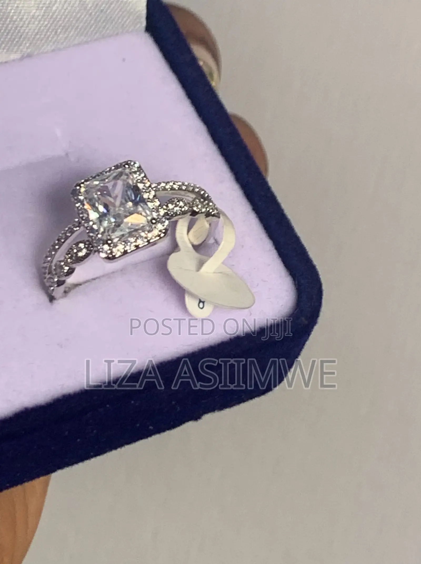 Sparkling Princess Cut Solitaire With Pave Band