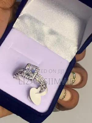Sparkling Princess Cut Solitaire With Pave Band