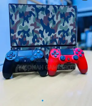 Sony Playstation 4 Standard With 18 Games, 2 Controllers