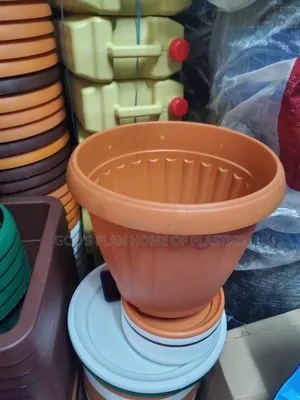 Photo - Round Imported Plastic Flower Pots