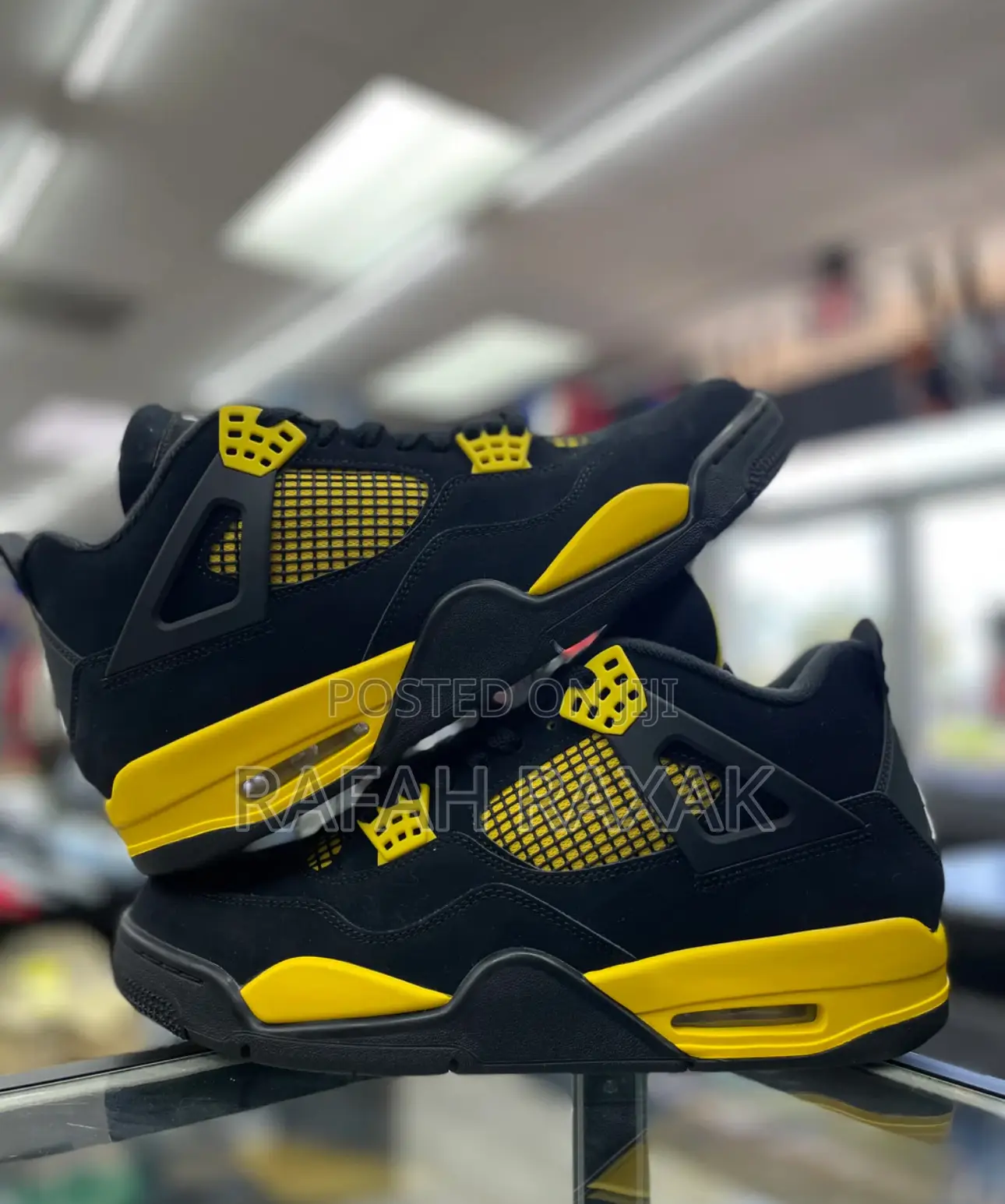 Black/Yellow Air Jordan 4 Retro “Thunder Yellow” Sneakers