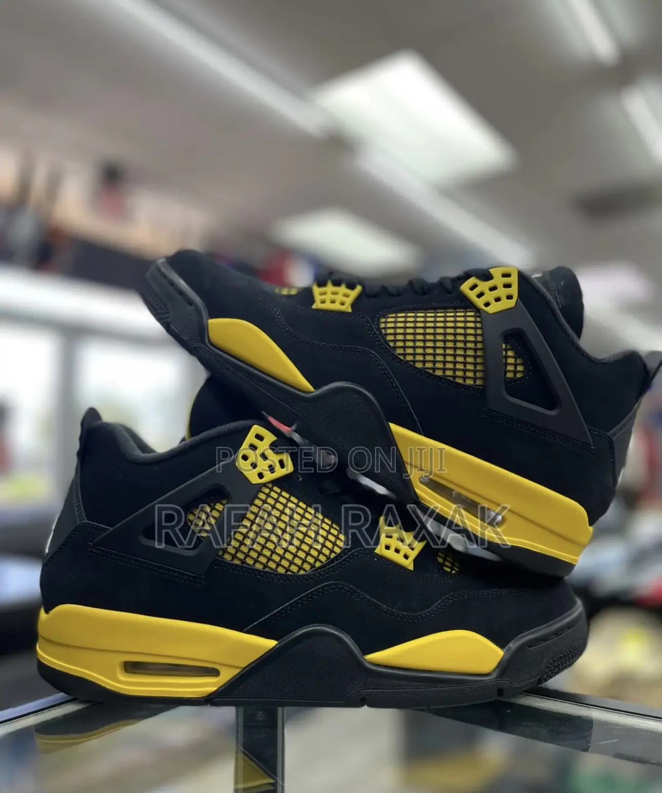 Black/Yellow Air Jordan 4 Retro “Thunder Yellow” Sneakers