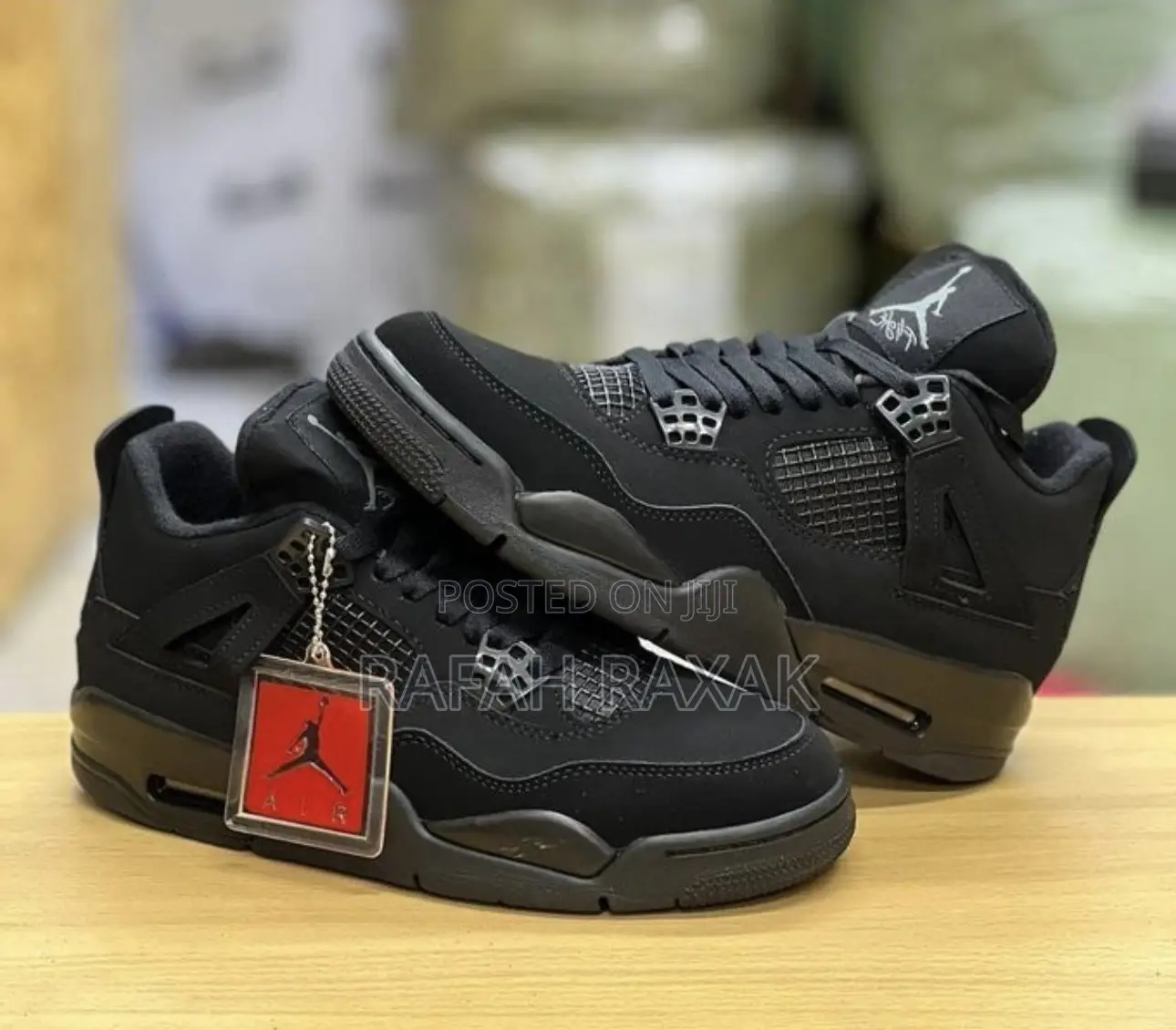 Original Triple Black Nike Air Jordan 4 Retro Sneakers