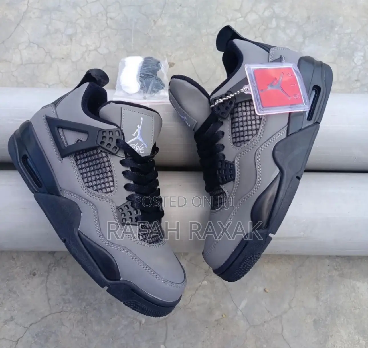 Original Grey Nike Air Jordan 4 Retro Sneakers