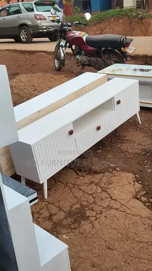 White Tv Stand With Mahogany Nobes