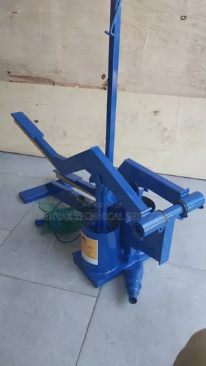 Money Maker Pump Complete With Suction and Delivery Pipes.