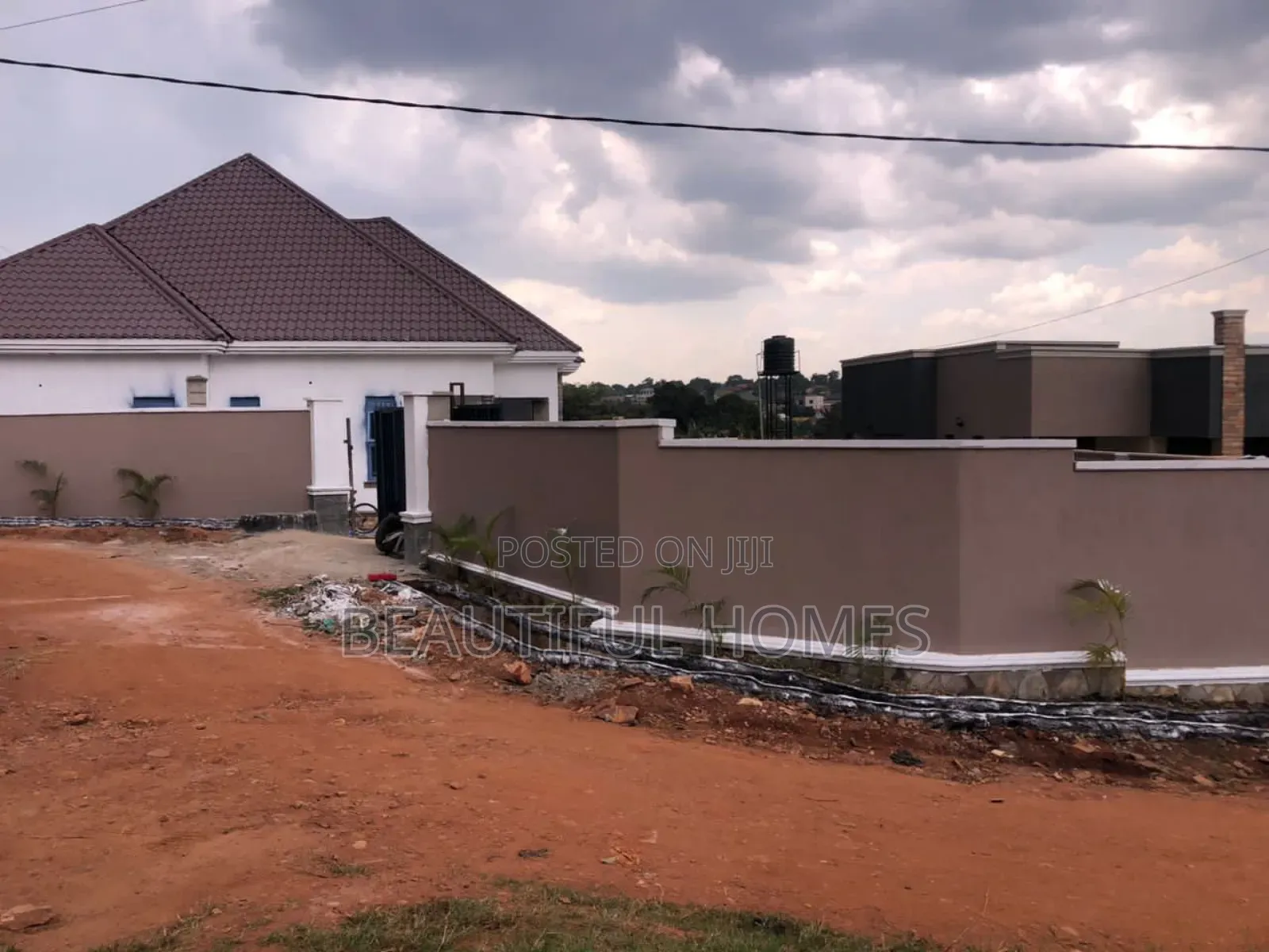 Furnished 4bdrm Bungalow in Kira for sale