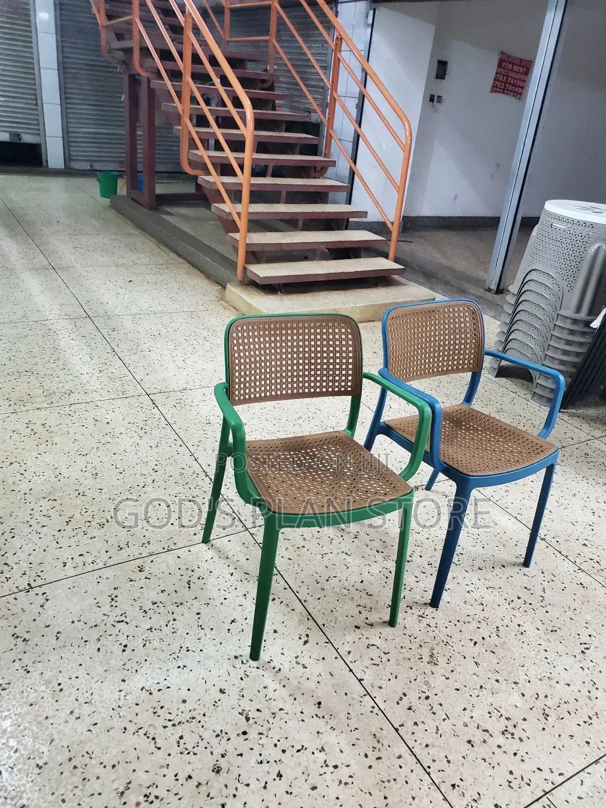 Green and Blue Stackable Plastic Chairs