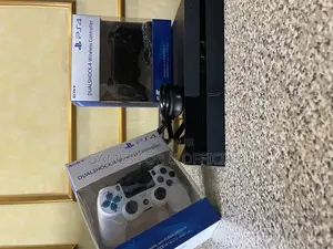 Sony Brand Ps4 Console With Black And White Pads Uk Used Fxt