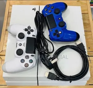 Photo - Chipped Ps4: Playstation 4,Great Condition, 12 Games, 2 Pads