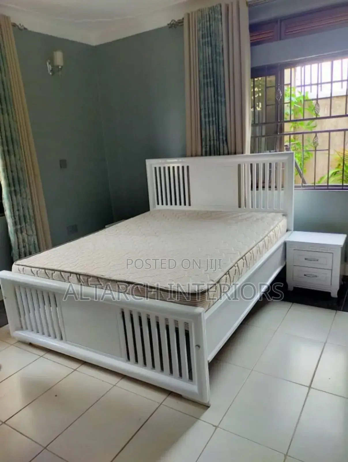 5by 6 White Bed in a Unique Design With a Bedside Drawer