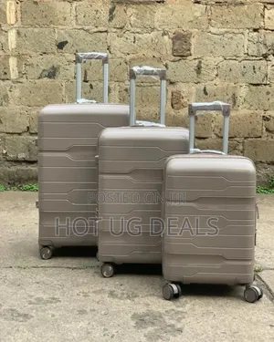 3 Pieces Set Of Waterproof Rubber Travel Suitcases- Vary
