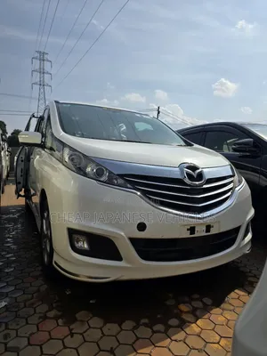 Photo - Mazda Biante 2017 White
