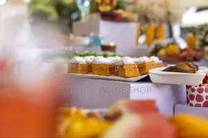 Cakes and Fruits Dessert Tables. Also Do Cooking