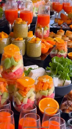 Fruits, Cakes and Juice Dessert Tabl3s Also Catering