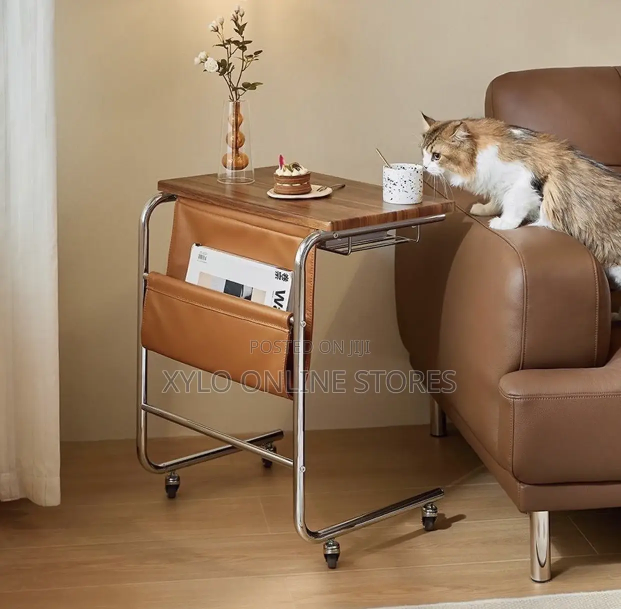 A C- Shaped Laptop Table With Rotating Wheels