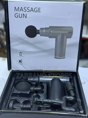 Photo - Massage Gun 4 Heads Machine
