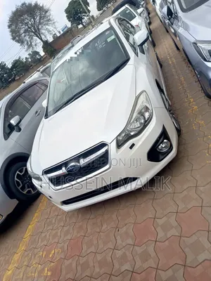 Photo - Subaru Impreza 2.0i PZEV 4dr Hatchback AWD (2.0L 4cyl CVT) 2015 Beige