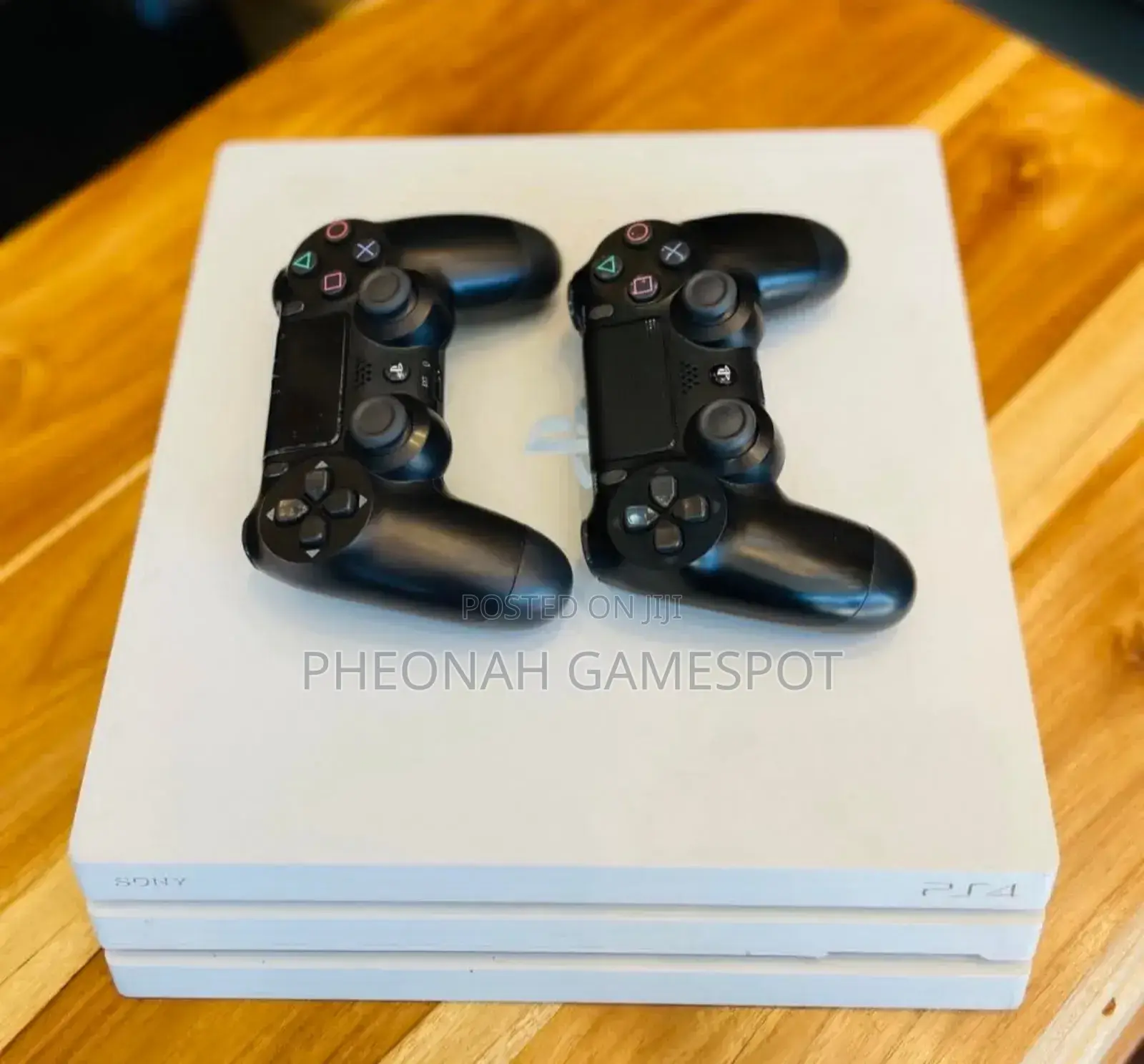 Chipped Playstation 4 Pro. 2 Controllers and 18 Games