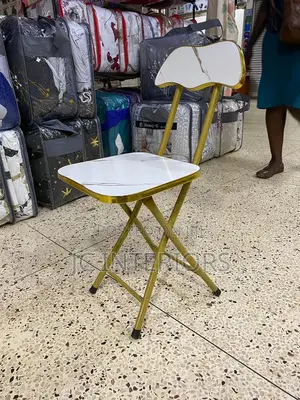 Foldable Table With One Chair *190,000*