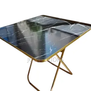 Foldable Table With One Chair *190,000*