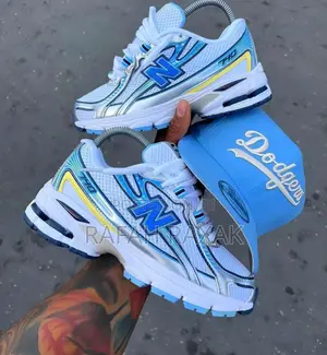 Original Blue/White New Balance 740 Sneakers