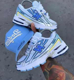 Original Blue/White New Balance 740 Sneakers