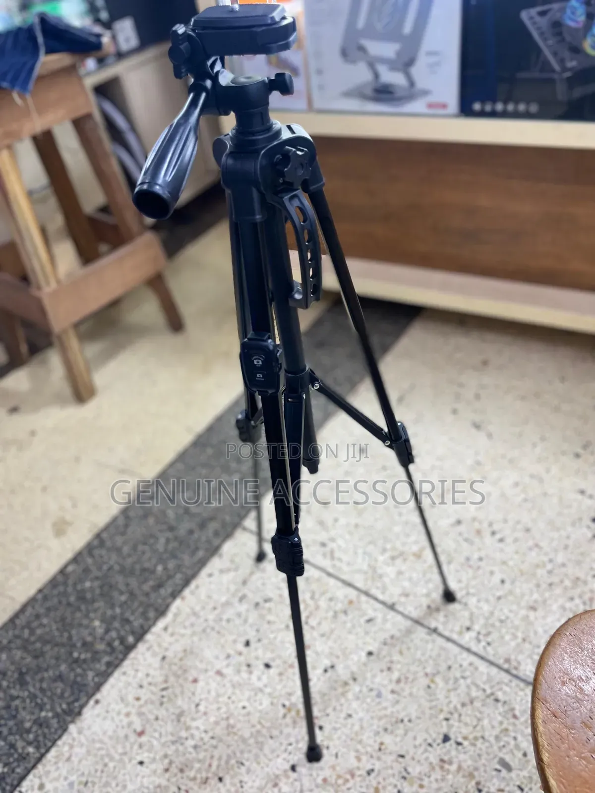 Phone and Camera Tripod Stand With a Remote