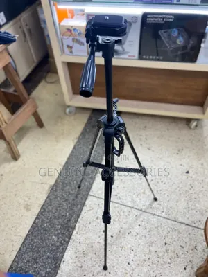 Phone and Camera Tripod Stand With a Remote