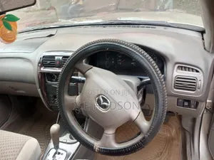 Mazda Capella 2005 Beige